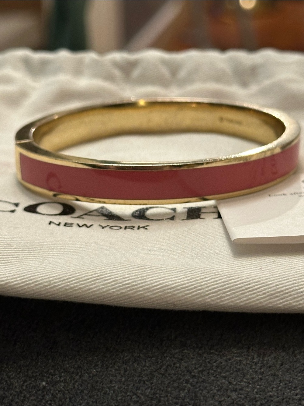 Coach Signature Gold-Tone Bangle with Pink Enamel Inlay - Picture 3 of 5